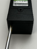 A screwdriver with a screwdriver

Description automatically generated